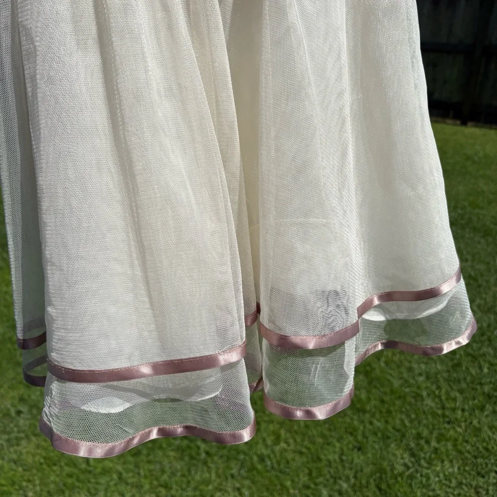 Rare Editions off white with taupe colored sash Size 4 Good used condition